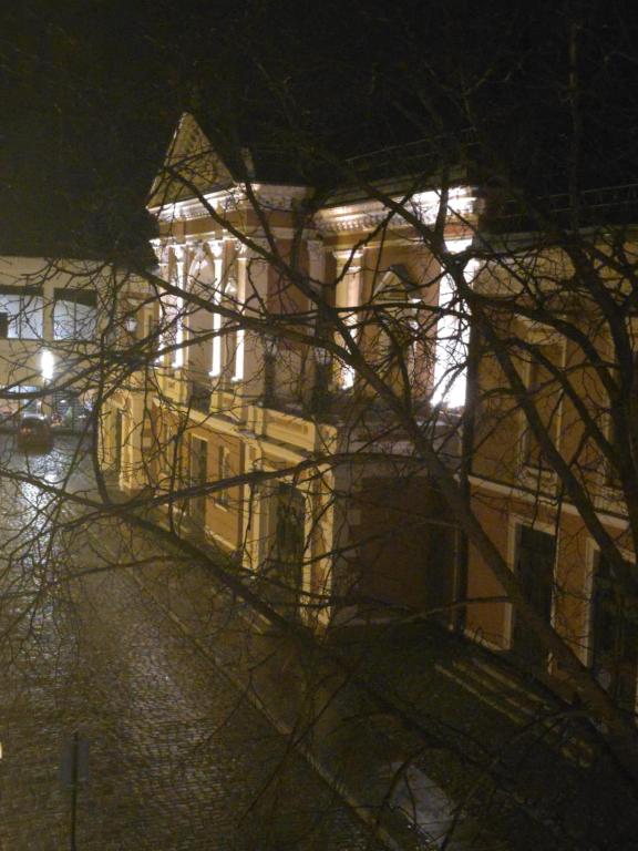 Night view of the illuminated Theatre building